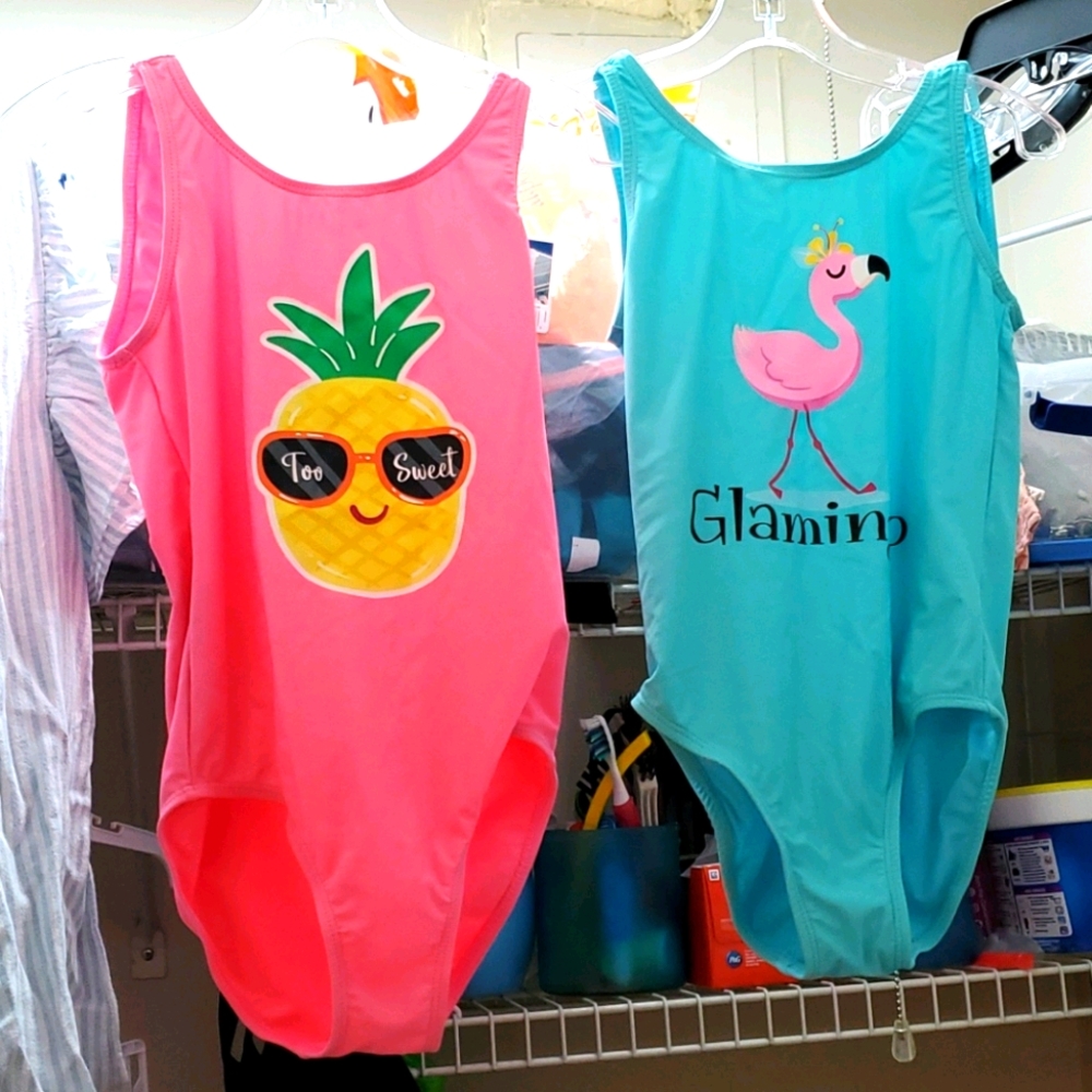 Two one piece swimsuits.